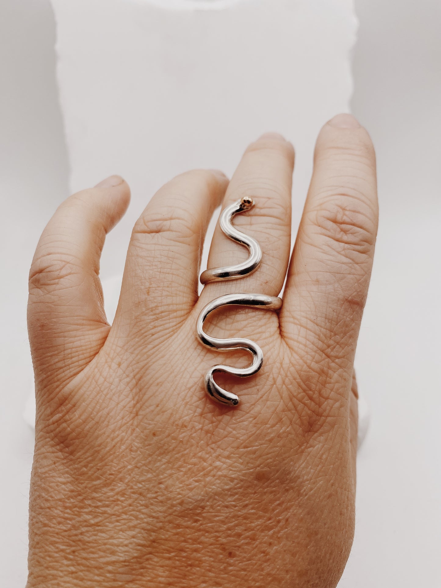 Serpent ring with rose gold